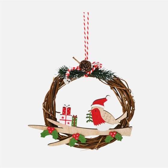 Ornement oiseau et cadeaux dans couronne