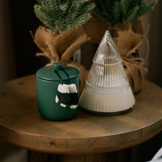 Sapin de Noël avec bougie en verre