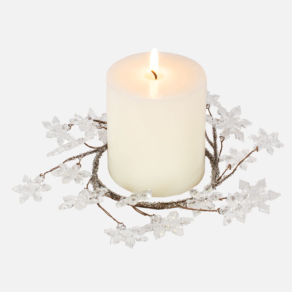 Anneau de bougie avec étoiles brillantes